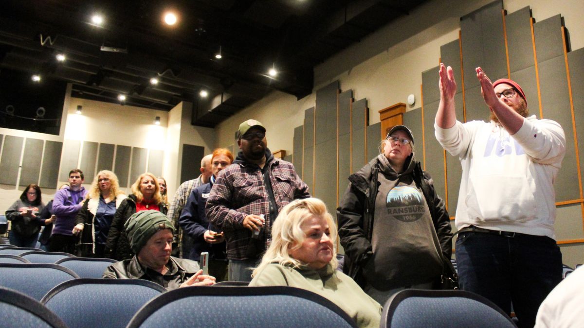Residents of Decatur Township line up to question developers about the data center proposal submitted by Sabey, a Seattle-based data center developer at a meeting on Thursday, Dec. 18, 2025.