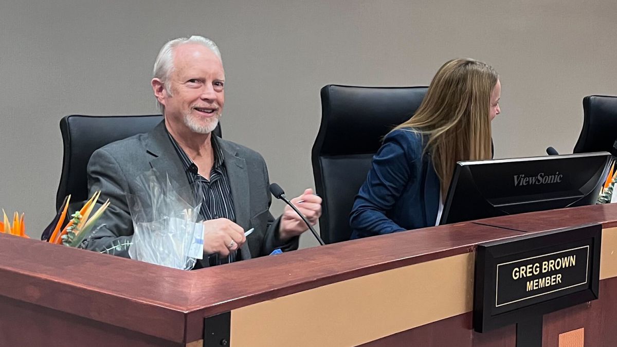 Greg Brown smiles after being sworn in as a member of the Carmel Clay School Board on Monday, Jan. 9, 2023 at the district's central office. Brown was the only winner on a slate of three conservative candidates running for three open seats in the November 2022 school board election. (Lee V. Gaines/WFYI)