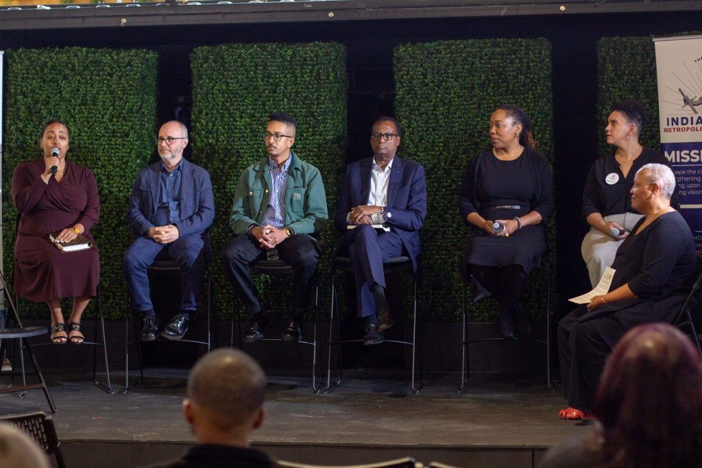 Representatives from consulting groups take part in a panel during a meeting about the redevelopment of Indiana Avenue on Tuesday, April 16, at the AMP at 16 Tech.