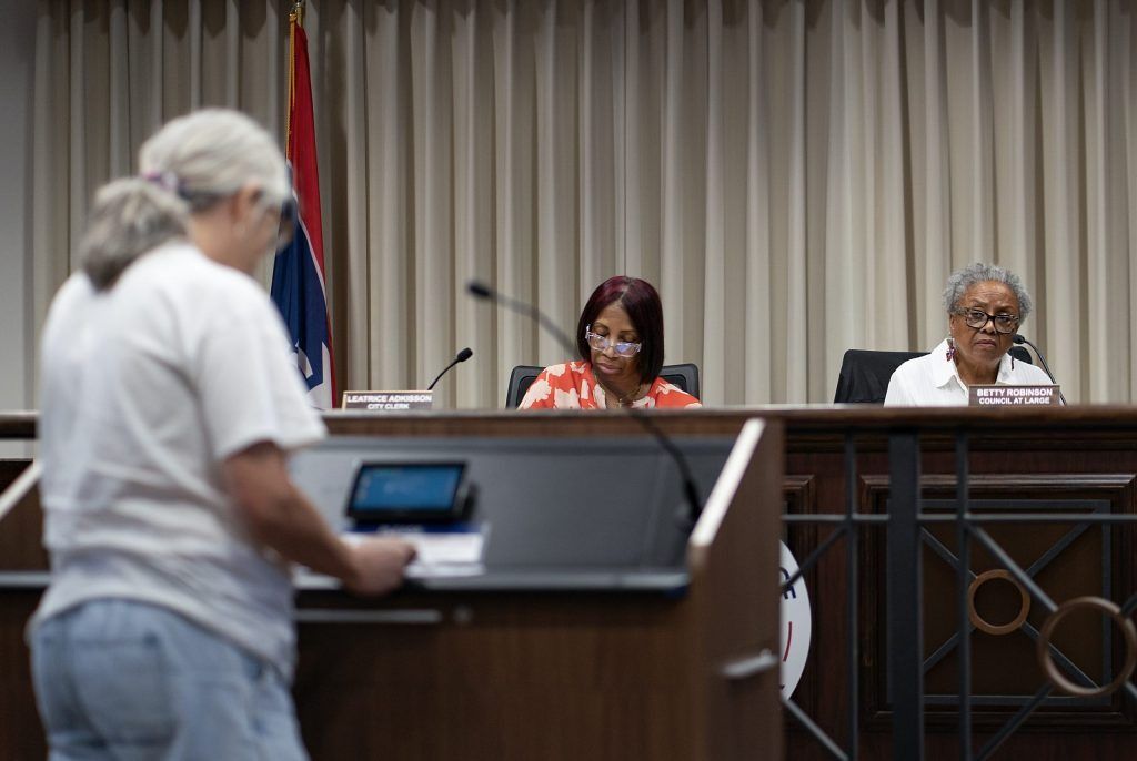 City clerk Leatrice Adkisson (center) and Council President Betty Robinson (right) listen as someone speaks during a Lawrence Common Council meeting Sept. 17, 2025, at the City of Lawrence Government Center. 
