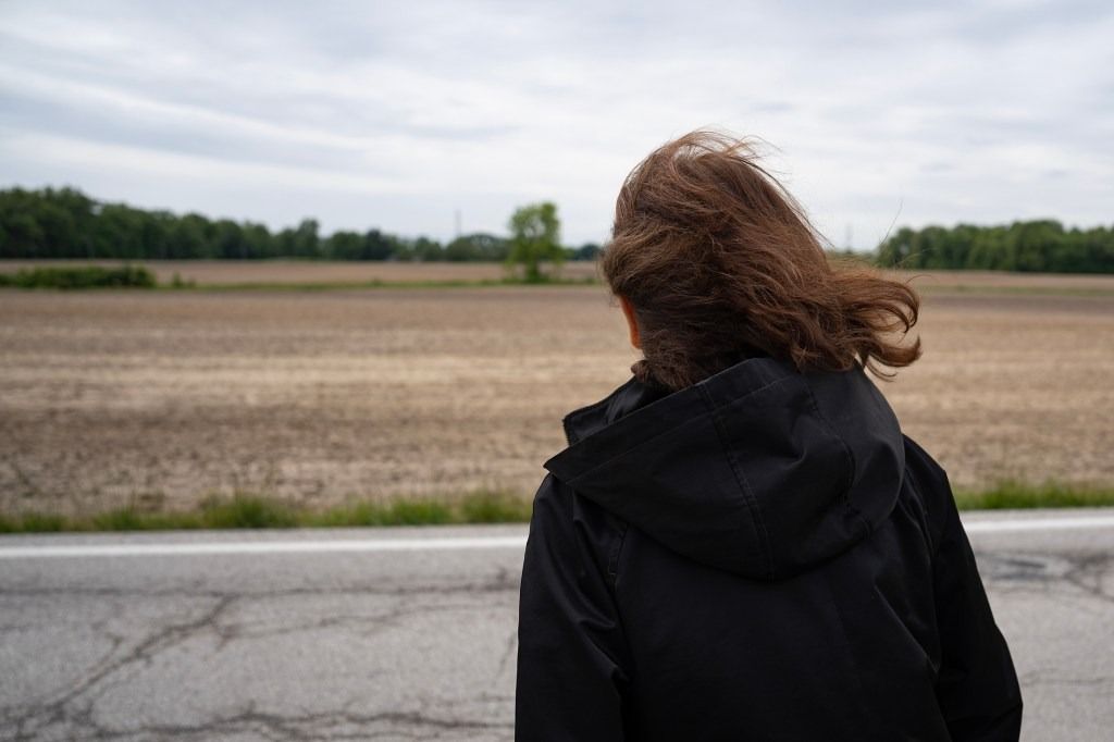 Carol Engh walks toward farmland May 27, 2025, which could become a proposed multi-building data center just across from her Franklin Township home. “We’ve got to hold on to some things, everything just goes,” Engh said of the land. “It just makes me sad, it’s what’s happening in this country.”