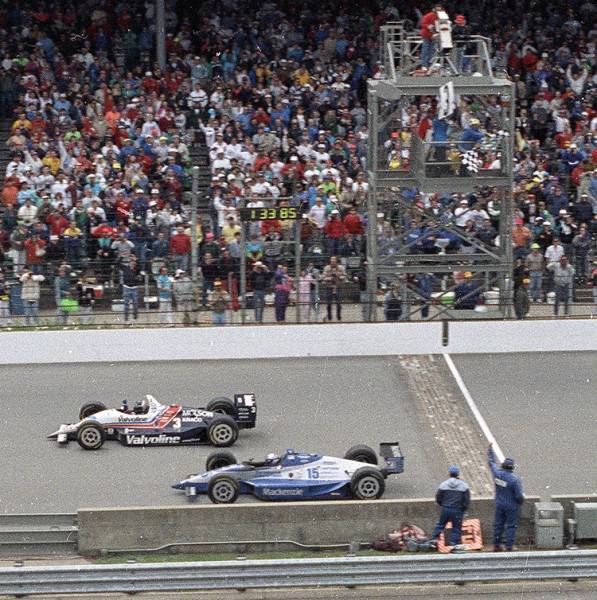 FILE - In this May 24, 1992, file photo, Al Unser Jr., top, of Albuquerque, N.M., wins the Indianapolis 500 by less than a car length ahead of Scott Goodyear, of Canada, at Indianapolis Motor Speedway in Indianapolis.