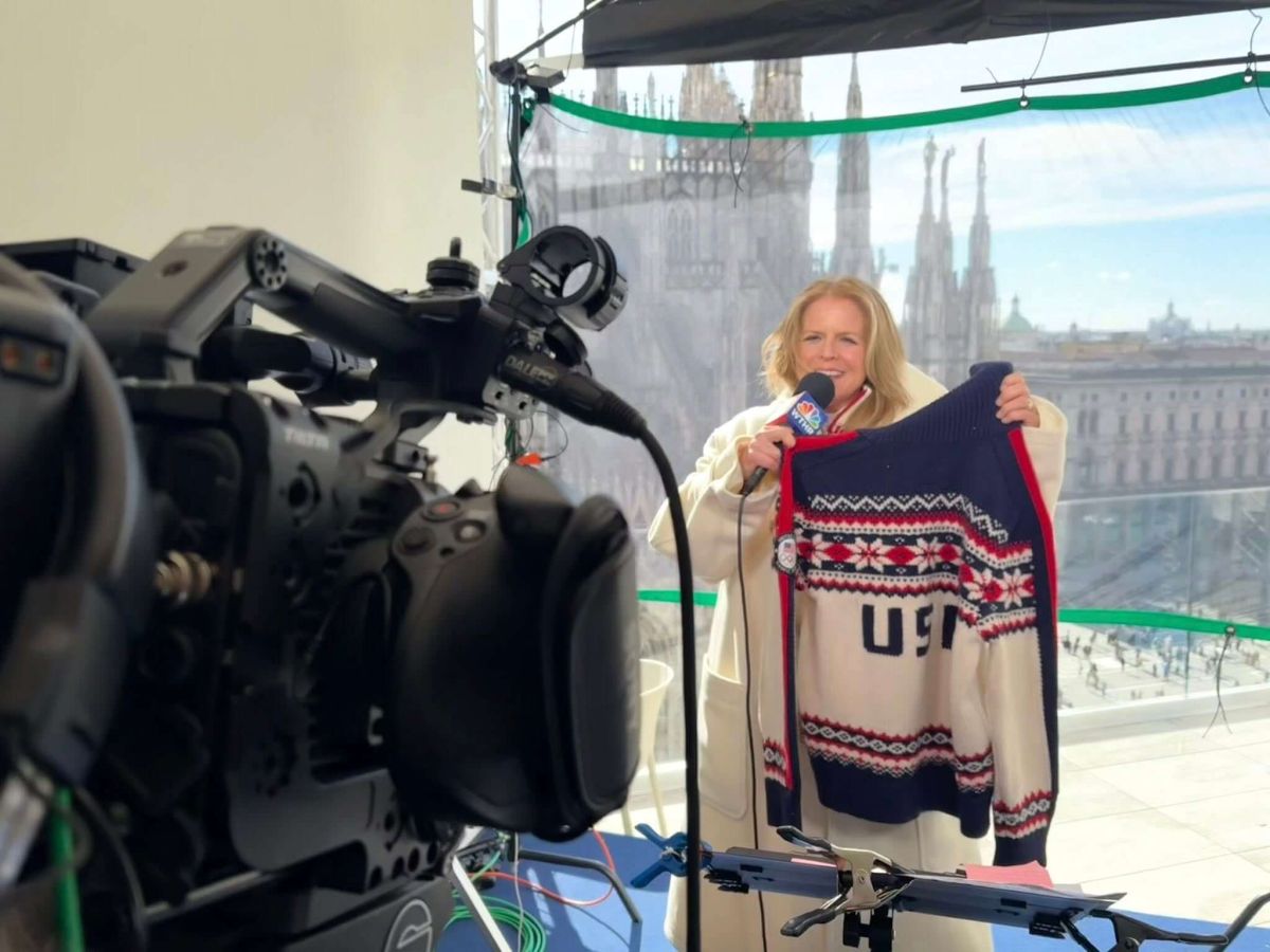 WTHR Anchor Anne Marie Tiernon showcases Team USA’s wardrobe for the 2026 Opening Ceremony, including this sweater designed by Ralph Lauren. The white coat Anne Marie is wearing was also part of the outfit.