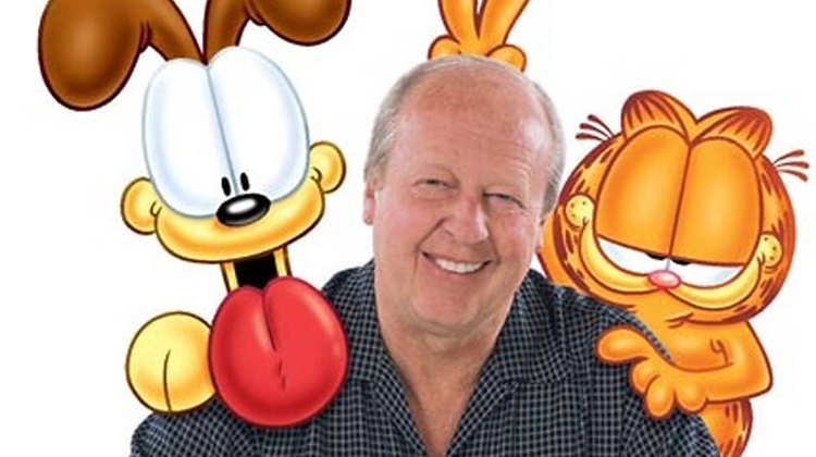 Garfield the cat (right) with Odie the dog and creator Jim Davis. - Provided by Ball State University