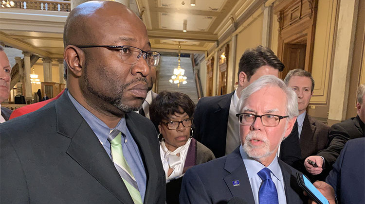 Sen. Greg Taylor (D-Indianapolis) and Sen. Tim Lanane (D-Anderson) discuss a change made to the hate crimes bill. - Brandon Smith/IPB News