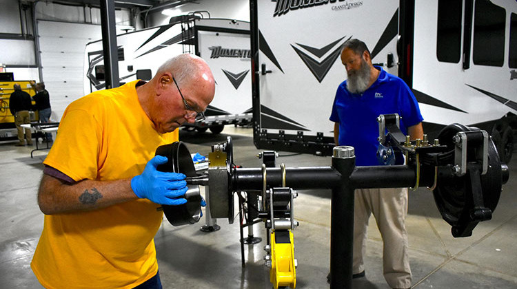 Ralph Decker completes his last practical exam under the supervision of instructor Mike Curl at the RV Technical Institute. - Justin Hicks/IPB News