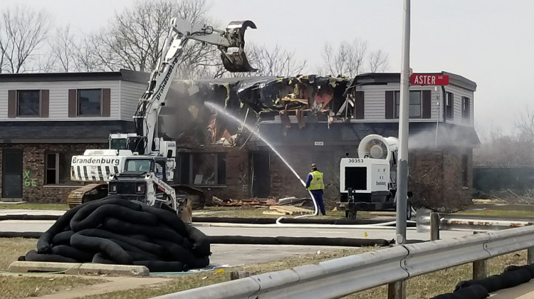 Crews tear down part of the West Calumet Housing Complex on April 2, 2018. Several residents were told the area would be turned into housing again after the lead and arsenic cleanup.  - Lauren Chapman/IPB News