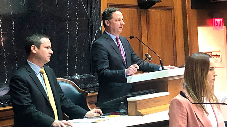 Indiana House Speaker Todd Huston speaks from the House podium during what is expected to be the final day of this year's legislative on Wednesday, March 11, 2020, at the Statehouse in Indianapolis. - AP Photo/Tom Davies