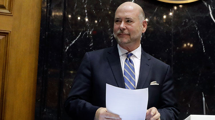 Speaker of the House Brian Bosma, R-Indianapolis, reads his notes before the start of the General Assembly session at the Statehouse, Wednesday, Jan. 3, 2018, in Indianapolis. - AP Photo/Darron Cummings