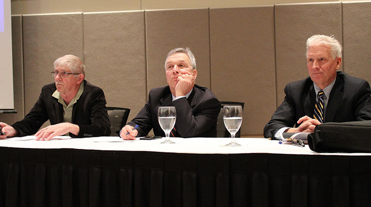 From left to right: ORSANCO commissioners Toby Frevert of Illinois, Ronald Potesta of West Virginia, and Joe Harrison, Jr. of Indiana hear public comments at a Thursday night hearing in Evansville. - Isaiah Seibert/WNIN