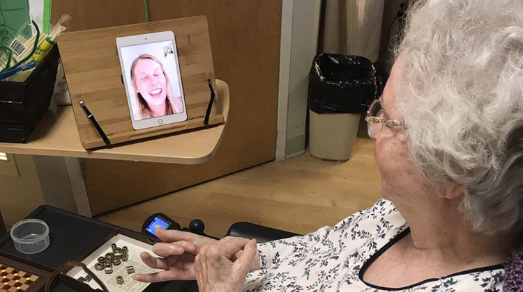 Oaknoll Retirement Residence resident Hope Solomons speaks with University of Iowa student Molly Anderson. Anderson used to work with Solomons in person, but since the COVID-19 outbreak, they have communicated through FaceTime.  - Lindsey Reed/Oaknoll Retirement Residence