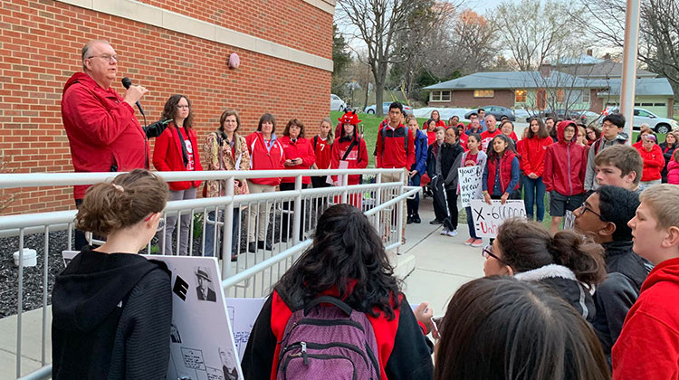 West Lafayette Superintendent Rocky Killion (at left, with microphone) says even his highly-rated school corporation might suffer from a new teacher pay formula pushed by Republican lawmakers and Gov. Eric Holcomb. - Stan Jastrzebski/WBAA News