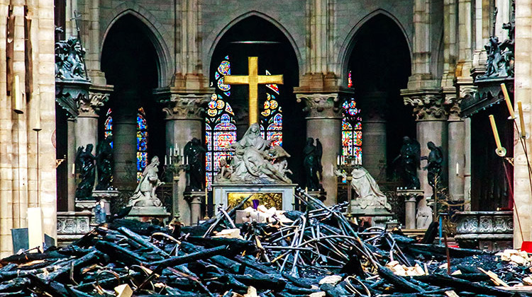 Debris are seen inside Notre Dame cathedral in Paris, Tuesday, April 16, 2019. Firefighters declared success Tuesday in a more than 12-hour battle to extinguish an inferno engulfing Paris' iconic Notre Dame cathedral that claimed its spire and roof, but spared its bell towers and the purported Crown of Christ. - Christophe Petit Tesson, Pool via AP