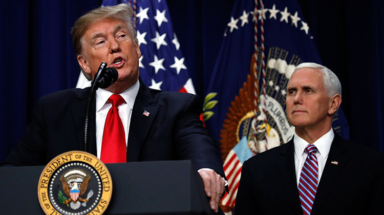 As Vice President Mike Pence listens, President Donald Trump speaks during a signing ceremony on Dec. 20, 2018.  - AP Photo/Jacquelyn Martin