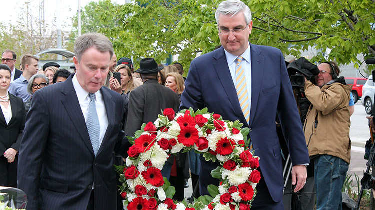 Indianapolis Mayor Joe Hogsett and Gov. Eric Holcomb lay a wreath at Richard Lugar Plaza in Indianapolis.  - Lauren Chapman/IPB News