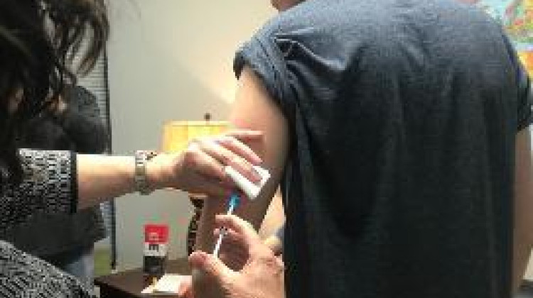 Nicholas Richter gets a measles vaccine shot from a nurse at a Louisville clinic. - Lisa Gillespie/WFPL for Side Effects Public Media