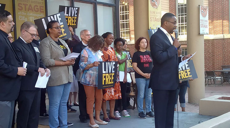 Pastor John Girton Jr. speaks during a Faith In Indiana vigil remembering Aaron Bailey, and praying for the termination of the officiers involved in his death. - Lauren Chapman/IPB News