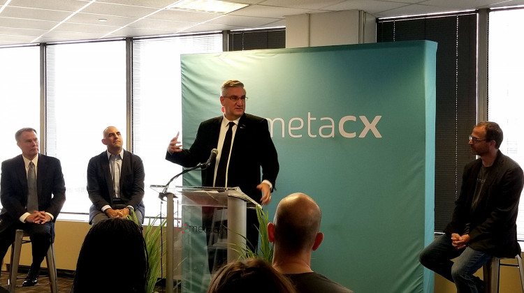 Gov. Eric Holcomb joined by city and MetaCX leaders gives remarks on the tech companies growth. - Samantha Horton/IPB News