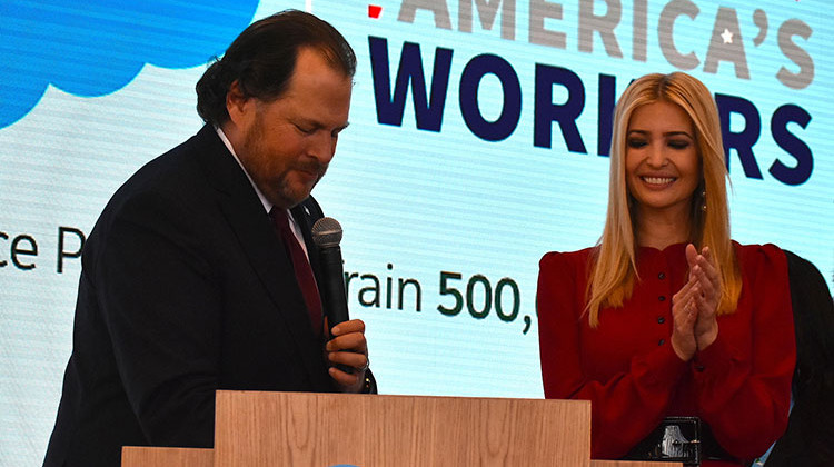 Salesforce Chairman Marc Benioff signs President Trump's "Pledge to America's Workers" alongside Ivanka Trump. - Justin Hicks/IPB News