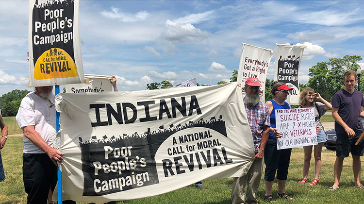 Supporters of the Indiana Poor People's Movement gathered at Burns Park Tuesday. - Cora Butrum/WFYI