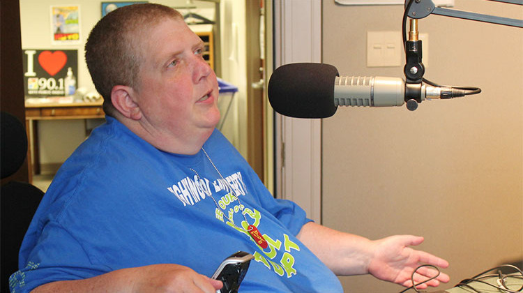 ADAPT member Cal Montgomery in the WFYI studio. - Jill Sheridan/IPB News