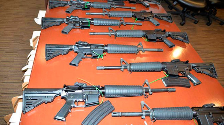 This undated photo provided by the United States Department of Justice in Indiana shows .223 caliber rifles manufactured by Mahde and Moyad Dannon in Indiana, including six fully-automatic weapons intended for shipment to the Middle East to support ISIS.  - United States Department of Justice via AP