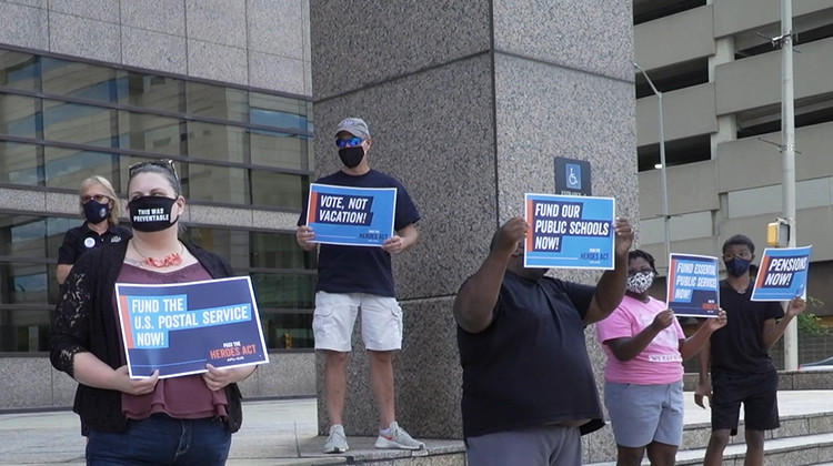 Labor Leaders Rally For HEROES Act Outside Offices Of Senators Braun, Young