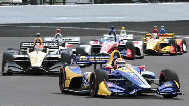 Alexander Rossi (27) leads James Hinchcliffe (5) and others into turn 13 during the IndyCar Grand Prix at the Indianapolis Motor Speedway on Saturday, May 12, 2018. - FILE: Doug Jaggers/WFYI