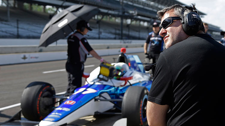 Former race driver Tony Stewart watches from the pit box of Jay Howard, of England, during a practice session at Indianapolis Motor Speedway, Thursday, May 18, 2017. - AP Photo/Michael Conroy