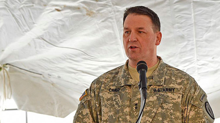 Former contract worker Shari McLaughlin filed a lawsuit this month in Marion County Superior Court against Major General Courtney Carr, Adjutant General of the Indiana National Guard, shown here speaking during a March 2016 ceremony at Camp Atterbury. - Master Sgt. Brad Staggs/Atterbury-Muscatatuck Public Affairs