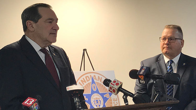 Sen. Joe Donnelly (D-Ind.), left, receives an endorsement from the Indiana Fraternal Order of Police and its president Bill Owensby, right. - Brandon Smith/IPB News