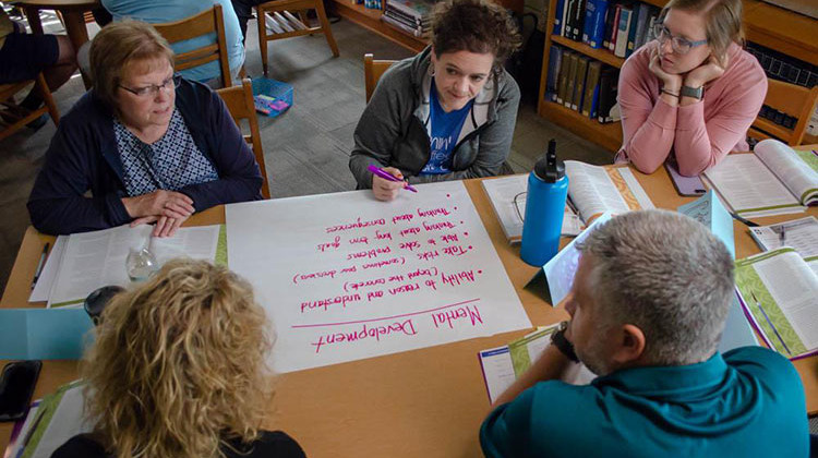 Storm Lake District teachers participate in an activity for Youth Mental Health First Aid. The course teaches educators how to spot mental illness in kids and how to get them help. - Natalie Krebs/Side Effects Public Media