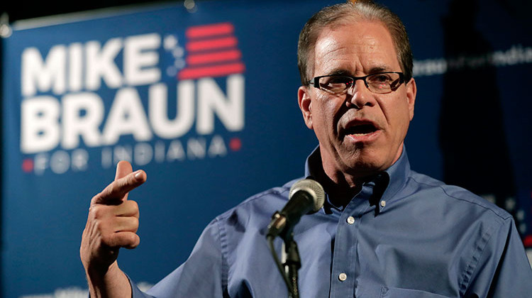 FILE - In this May 8, 2018 file photo Republican Senate candidate Mike Braun thanks supporters after winning the Republican primary in Whitestown, Ind. - AP Photo/Michael Conroy, File