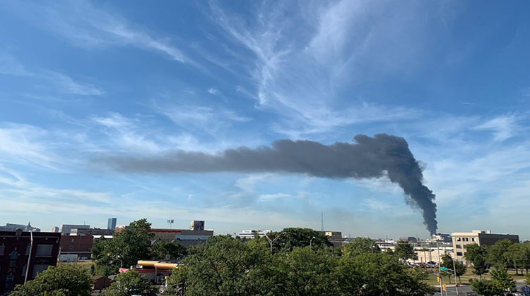 Smoke from a fire at a junkyard on the city's near west side is visible from WFYI around 10:30 a.m. Tuesday. - Doug Jaggers/WFYI