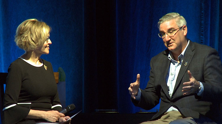 Gov. Eric Holcomb and AIM President Brenda Young discuss state infrastructure.