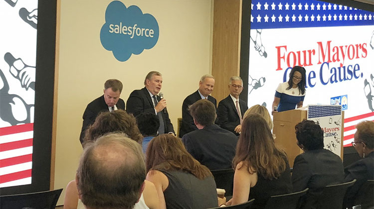 Current Indianapolis Mayor Joe Hogsett, alongside former mayors Greg Ballard, Bart Peterson, and Stephen Goldsmith discussing poverty in Indianapolis. - Carter Barrett/WFYI