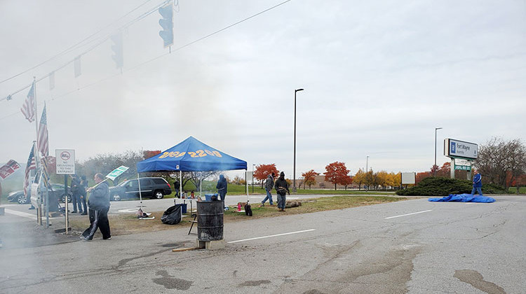 UAW members beginning cleaning up outside the General Motors plant in Fort Wayne. - Samantha Horton/IPB News