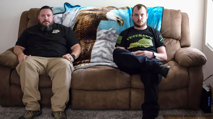 Veteran's Club Founder Jeremy Harrell and Alex Randolph inside Randolph's Louisville home. - Lisa Gillespie/Side Effects Public Media