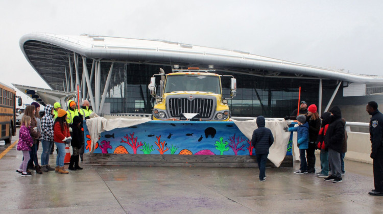 McClelland Elementary School students help unveil their snowplow art at the Indianapolis International Airport. - Photo provided by Stephanie McFarland