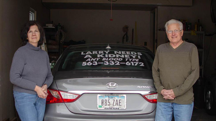 Bettendorf, Iowa, resident Larry Burkholder and his wife, Ellen, put signs on their cars looking for a kidney donor for him. - Natalie Krebs/Side Effects Public Media