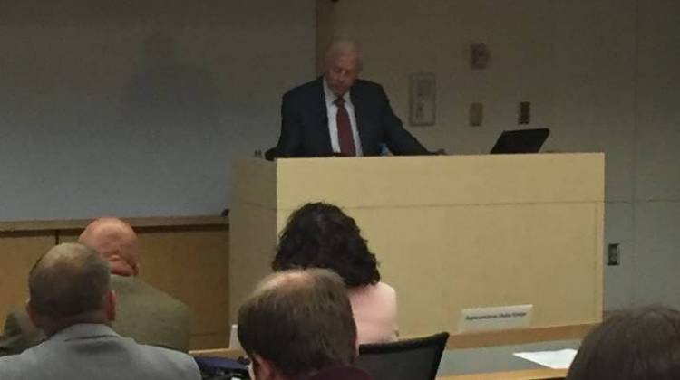 Jim McClelland speaks to a crowd during a discussion on opioid addiction.  - Jill Sheridan/IPB News