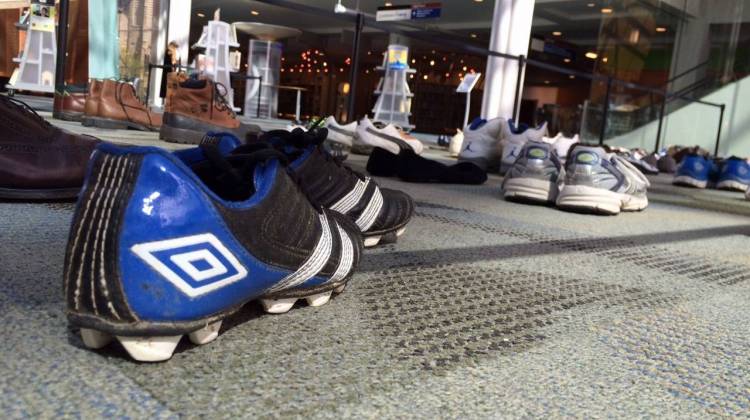 135 pairs of shoes at the Central Library represent Indy's 135 victims of criminal homicide in 2014. - Christopher Ayers/WFYI