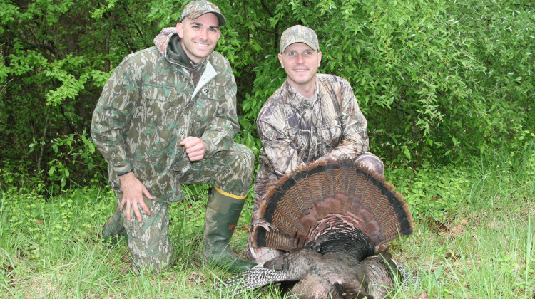 Kyle Allen, a Virginia state law enforcement officer, and Capt. Jacob Johnson, Marine Corps Systems Command, pose with a 20-pound turkey Johnson shot during a hunt at a Virginia Marine Corps base in 2016.  - Adele Uphaus-Conner/U.S. Marine Corps