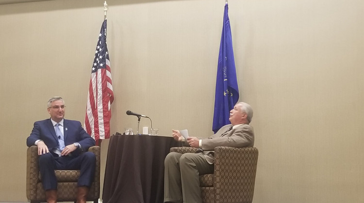 Indiana Farm Bureau President Randy Kron talks with Gov. Eric Holcomb about issues impacting the Hoosier agriculture industry. - FILE PHOTO: Samantha Horton/IPB News