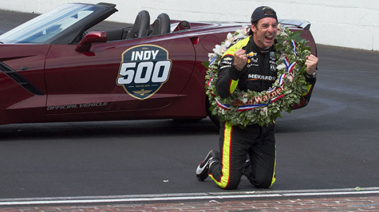 Simon Pagenaud reacts after kissing the yard of bricks at the Indianapolis Motor Speedway. He won the Indianapolis 500 Sunday, May 26 by 0.2086 seconds over Alexander Rossi. - Doug Jaggers/WFYI