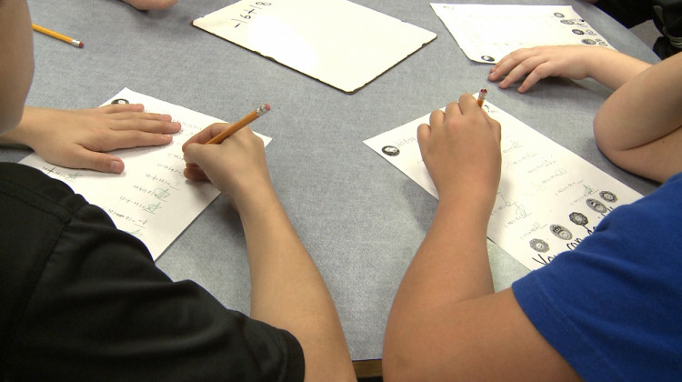 Kids writing in class. - FILE PHOTO: WFIU/WTIU