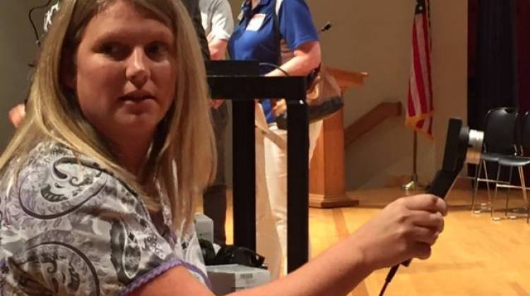 School nurse Heather Gordon demonstrates the new equipment.