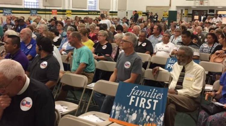 Faith leaders and community activists gathered Wednesday evening to rally against the federal budget soon up for consideration in Congress. - Jill Sheridan/IPB News