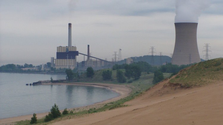 The power plant on the left is NIPSCO's Michigan City generating station, which the utility now plans to close by 2028. - Chris Light/Wikimedia Commons