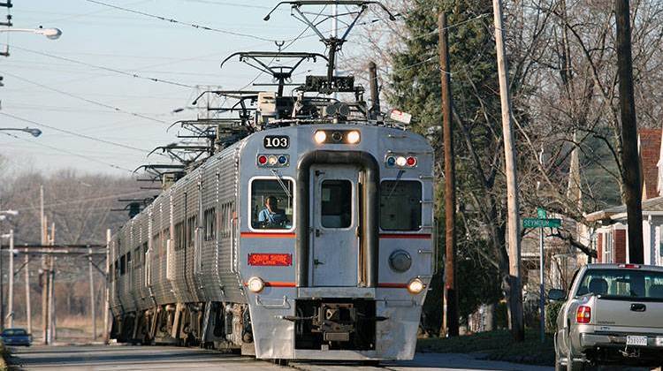 A South Shore Line train moves through Michigan City. - public domain